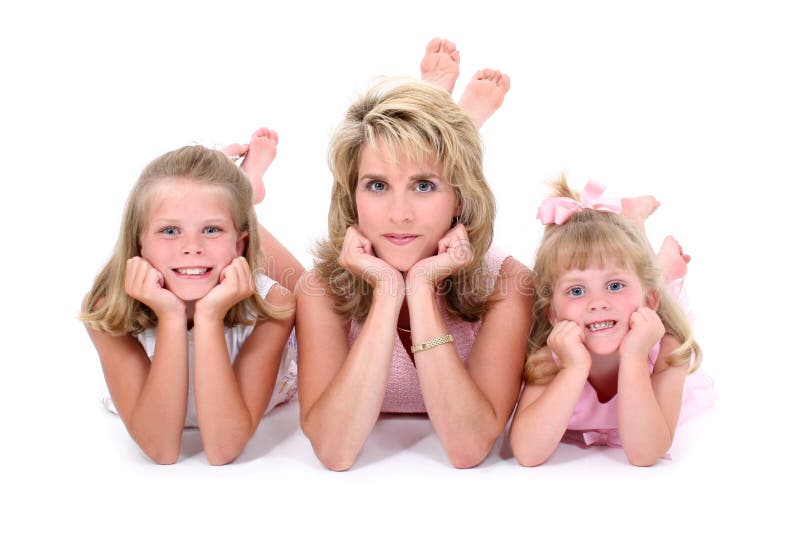 Beautiful Woman With Her Daughters Over White