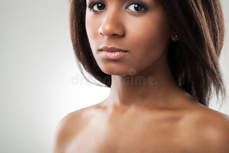 Beautiful woman with her shoulders naked closeup