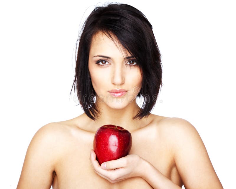 Beautiful woman holding an apple