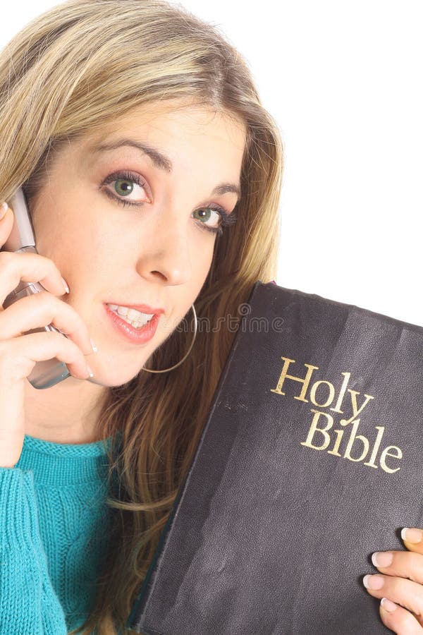 Beautiful woman holding a bible