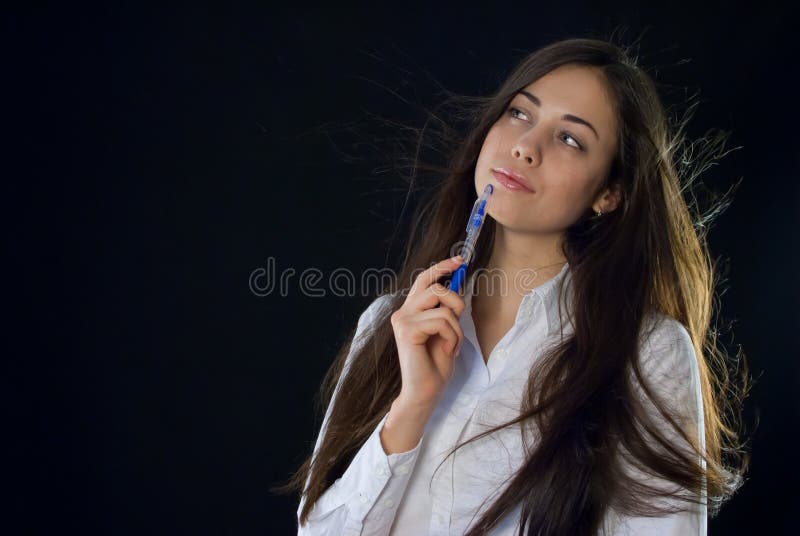 Beautiful woman holding blue pen