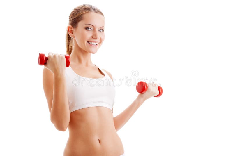 Beautiful woman holding dumbbells