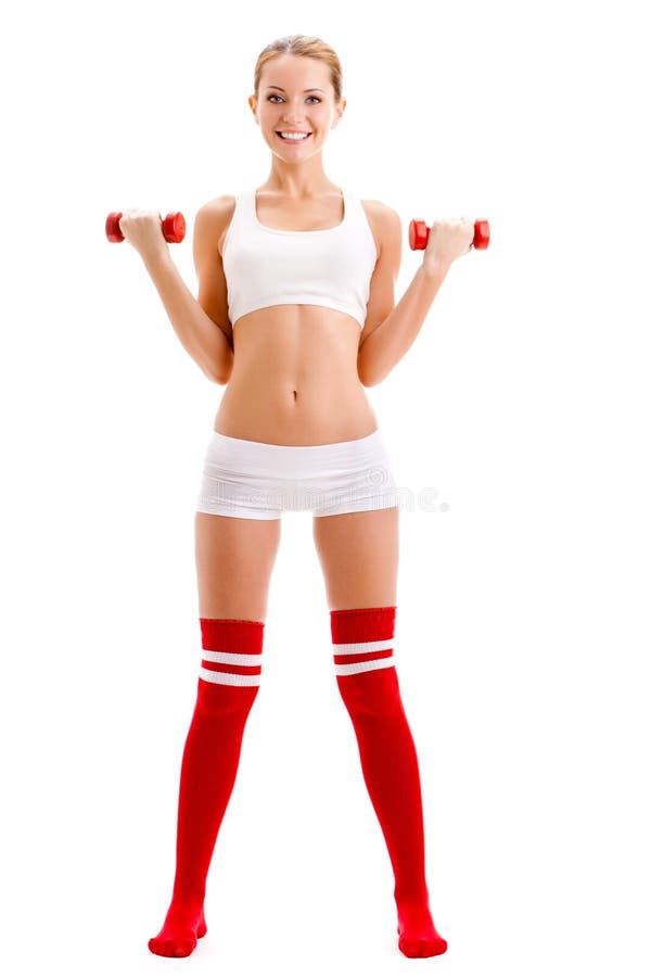 Beautiful woman holding dumbbells