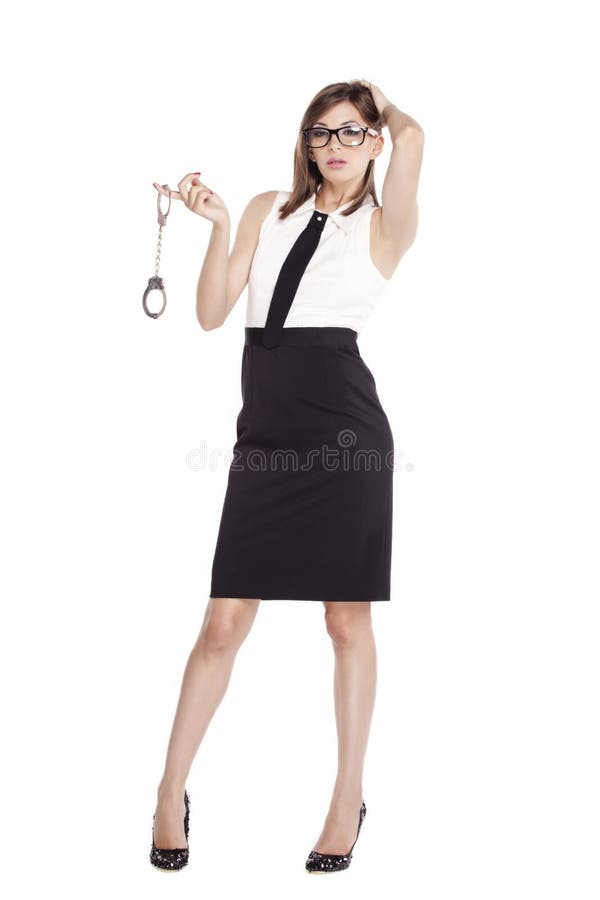 Beautiful woman holding a pair of handcuffs