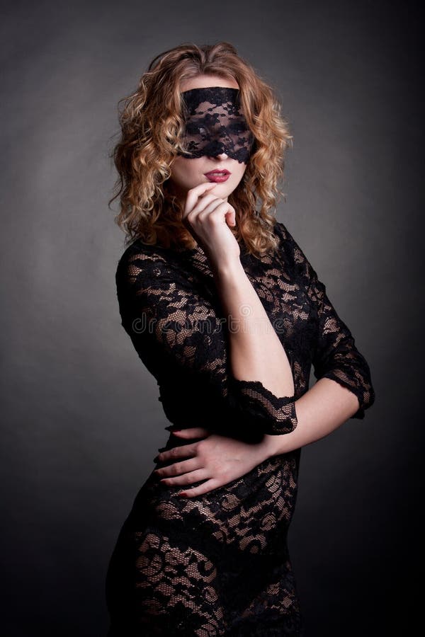 Beautiful woman with lace mask