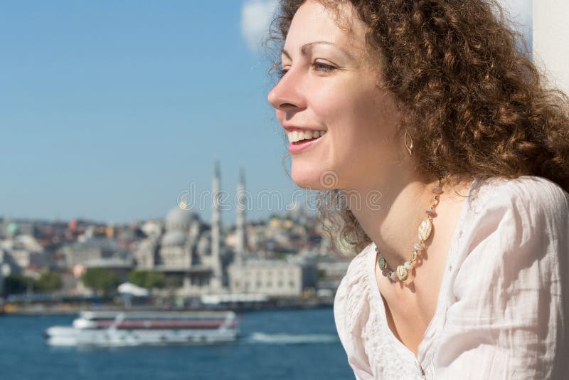 Beautiful woman in a landscape with a river royalty free stock photos