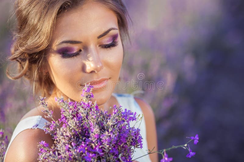 Beautiful woman and a lavender field