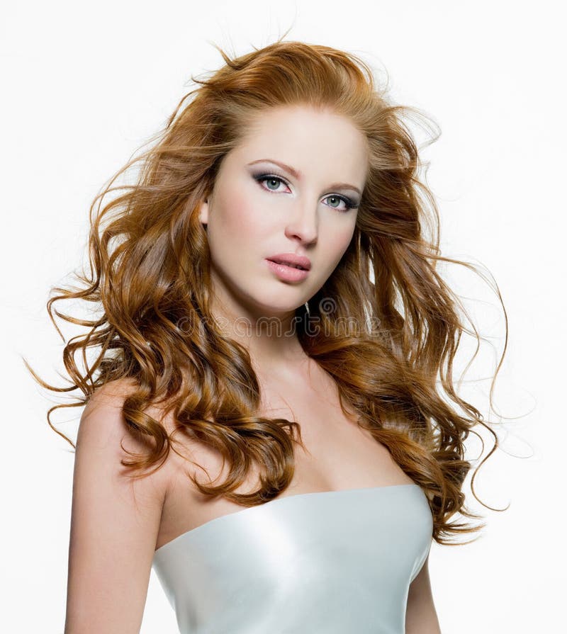 Beautiful woman with long curly-headed hairs royalty free stock images Beautiful woman with long curly-headed hairs royalty free stock images