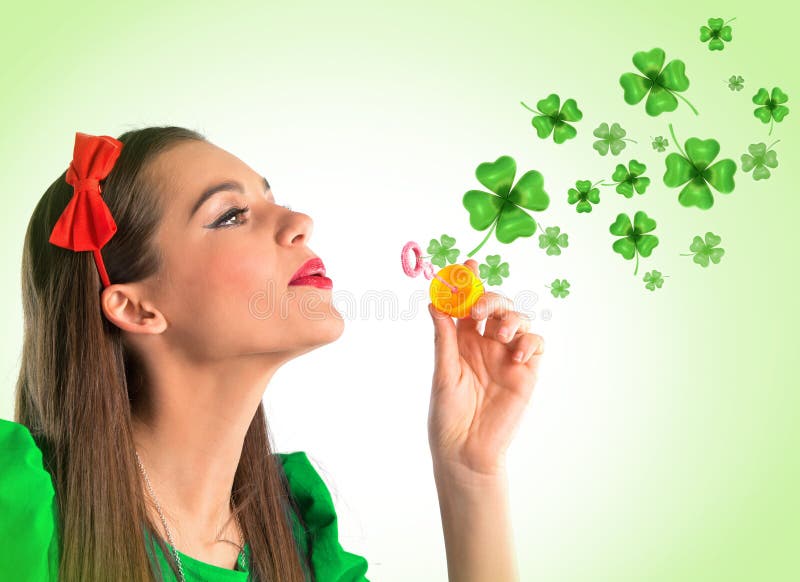 Beautiful woman making four leaf clover bubbles royalty free stock photo Beautiful woman making four leaf clover bubbles royalty free stock photo