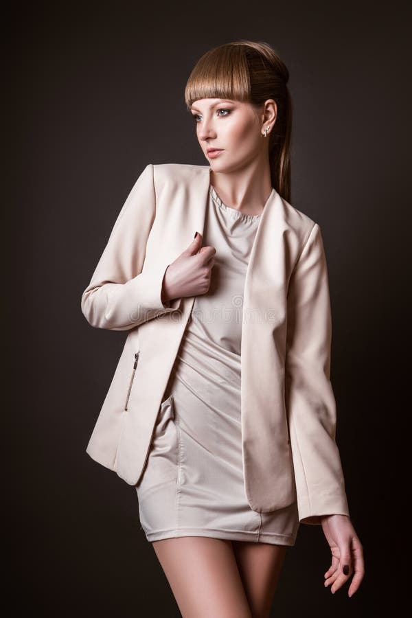 Beautiful Woman Model Posing in the Studio on Black Background Stock