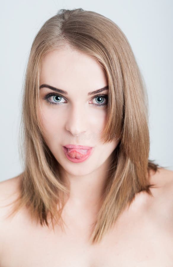 Beautiful Woman Model Sticking Tongue Out As Funny Face Concept Stock 