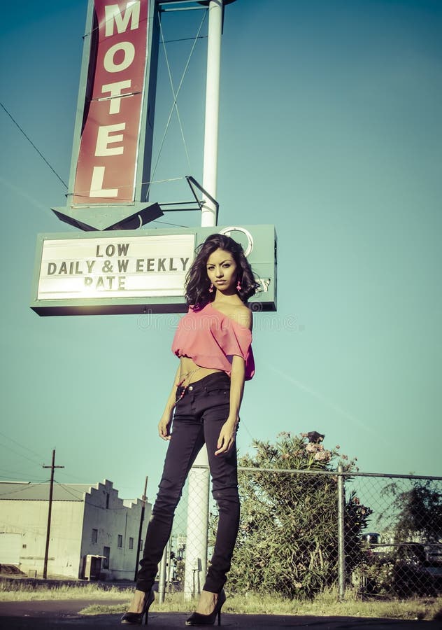 Beautiful woman motel sign