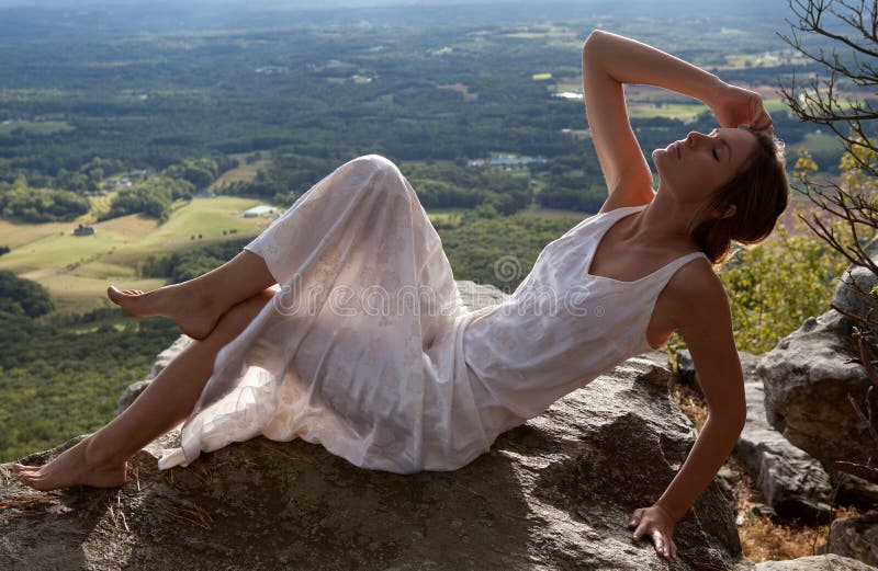 Beautiful Woman On Mountain With Scenic View