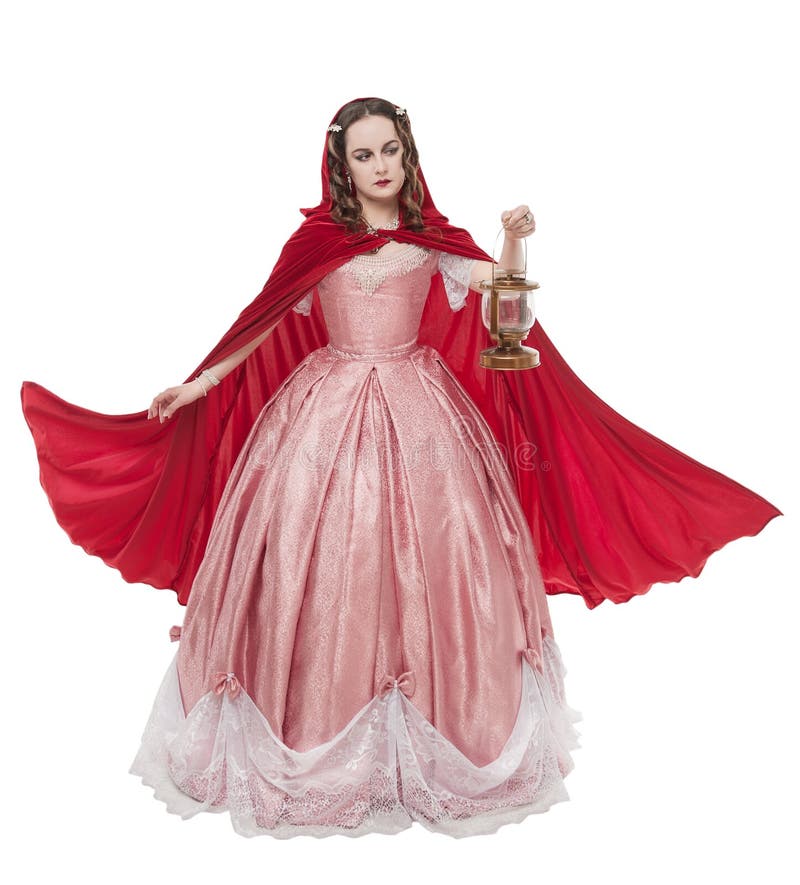 Beautiful woman in old historic medieval dress with lantern isolated stock images Beautiful woman in old historic medieval dress with lantern isolated stock images