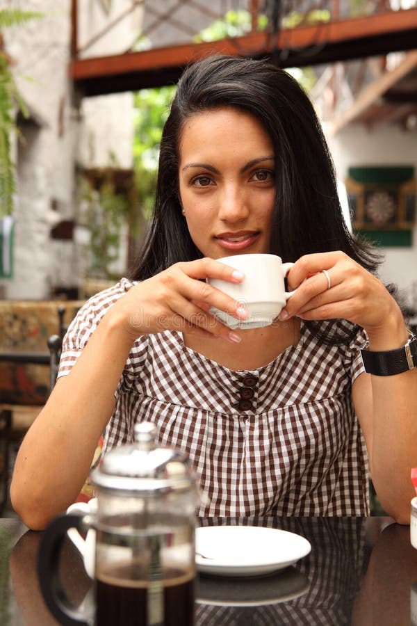 Beautiful Woman At Outdoor Cafe Drinking Coffee Stock Image - Image of