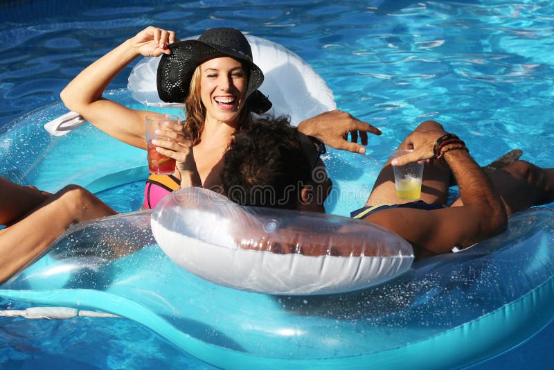 Beautiful woman during a party in a swimming pool