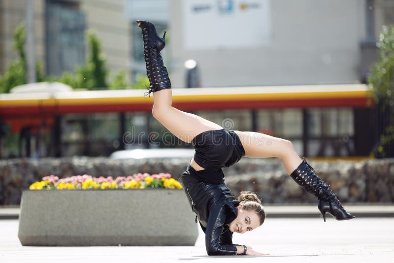 Beautiful woman performing acrobatics stock photo