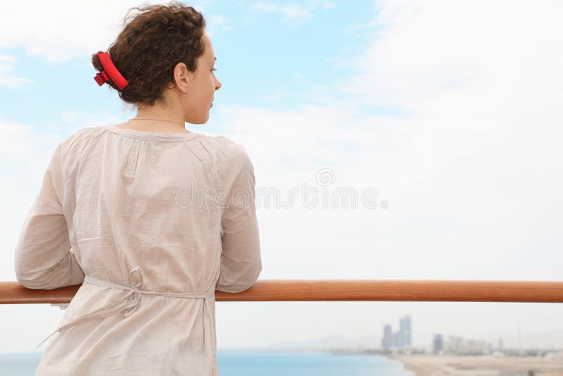 Beautiful woman in Qaboos Port. stock photo