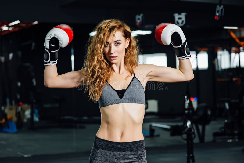 Beautiful Woman with the Red Boxing Gloves.