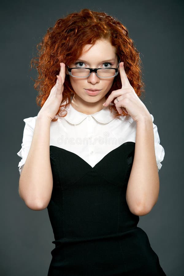 Beautiful woman with red curly hair