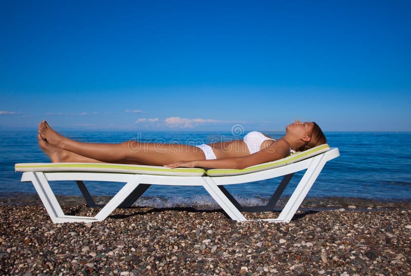 Beautiful woman relaxing on the beach