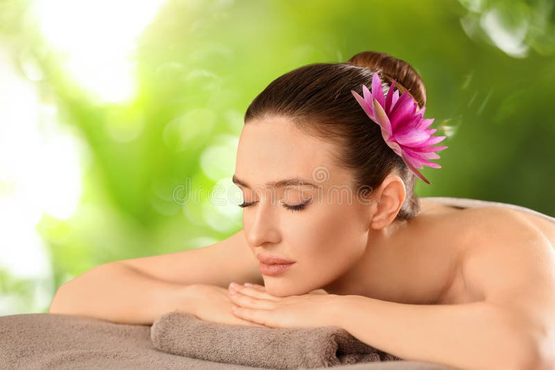 Beautiful Young Woman Relaxing On Soft Towel Spa Treatment Stock Image