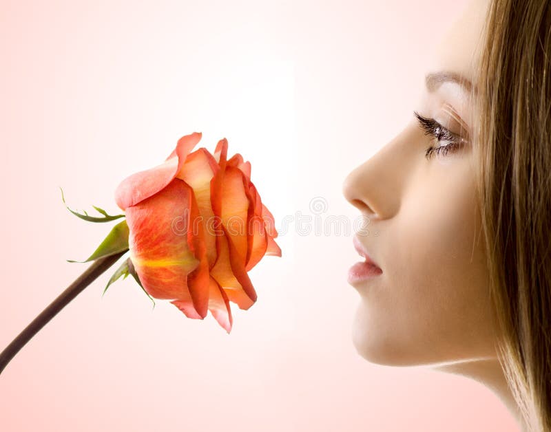 Beautiful woman with rose sideview