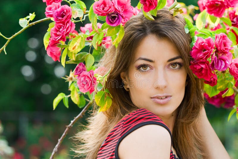 Beautiful woman with roses