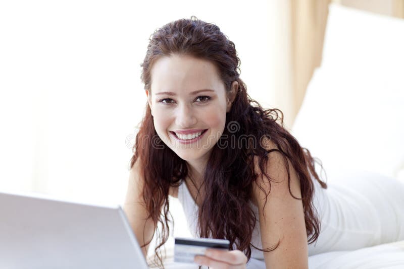 Beautiful woman shopping online royalty free stock image