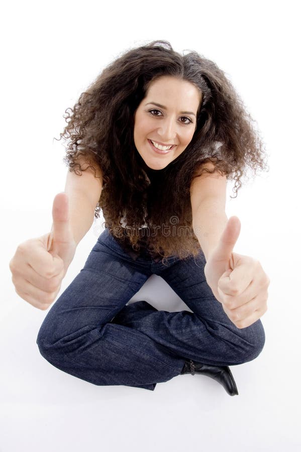 Beautiful woman showing thumbs up