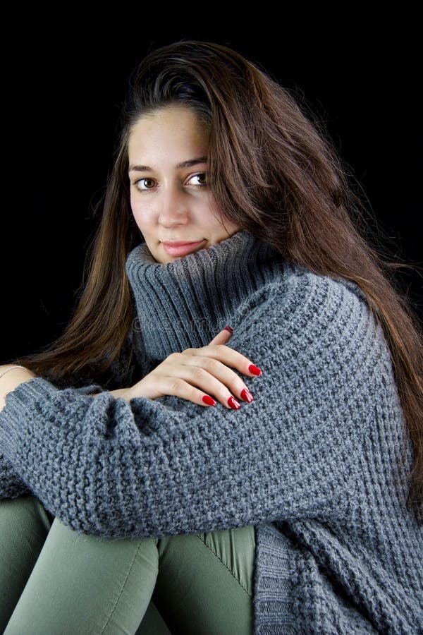 Beautiful Woman Sitting with Grey Wool Sweater and Red Nails Stock ...