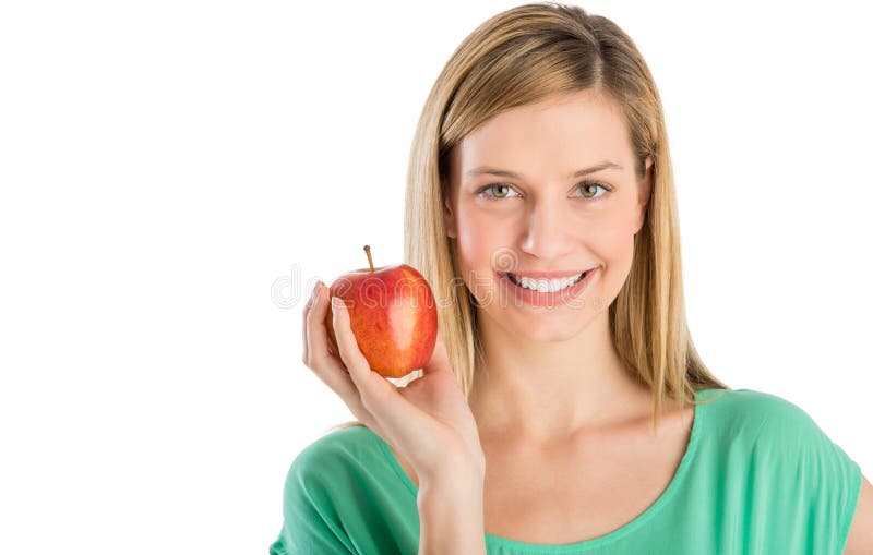 Beautiful Woman Smiling While Holding Apple