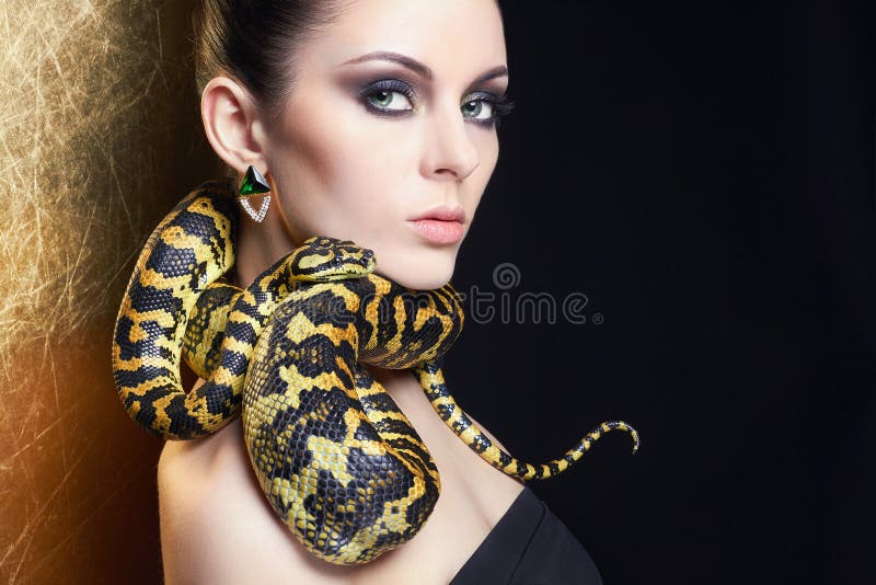 Beautiful woman with Snake stock image. Image of jewelry - 86086293