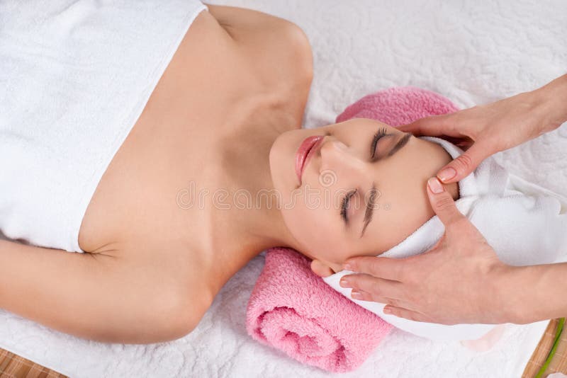 Beautiful woman in spa salon