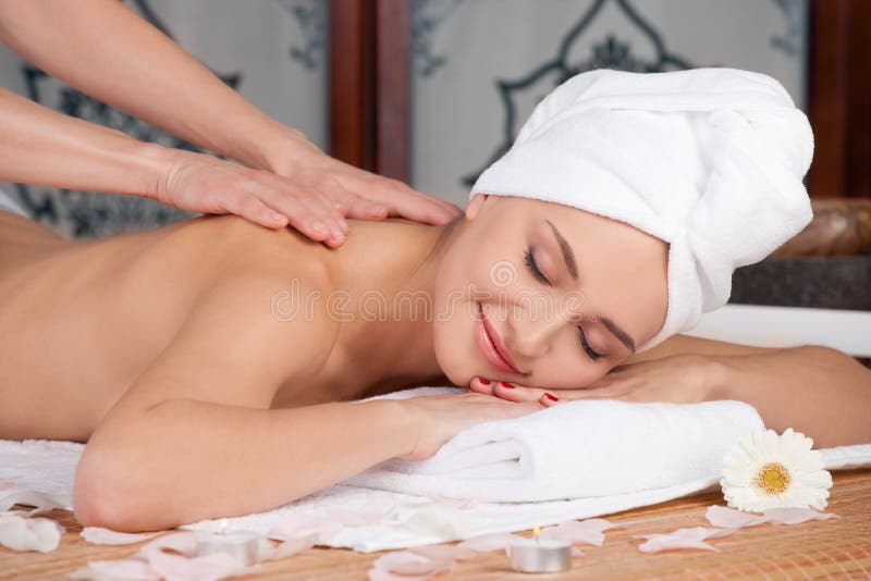 Beautiful woman in spa salon