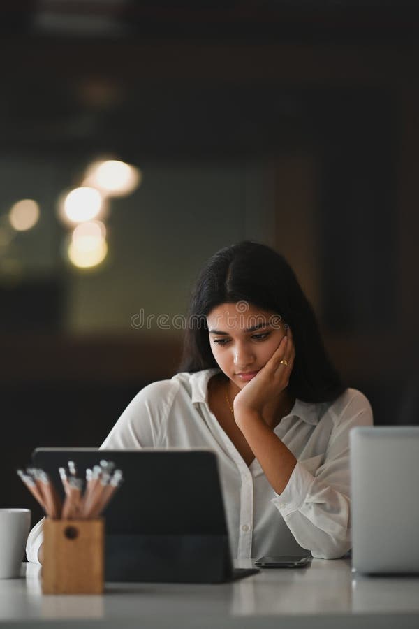 A beautiful woman strain moment in modern office. royalty free stock photo