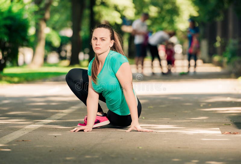 A Beautiful Woman Stretching Her Legs On A Sunny Day Stock Image Image Of Activity Happiness