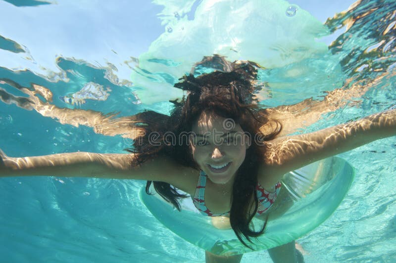 Beautiful Woman Swimming Underwater