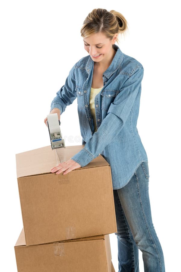 Beautiful Woman Taping Cardboard Boxes royalty free stock photography Beautiful Woman Taping Cardboard Boxes royalty free stock photography