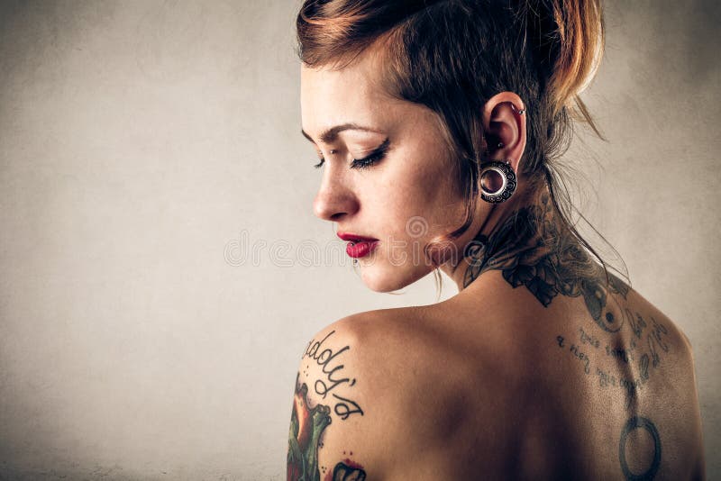 Beautiful Woman With Tattoos On Body At Wooden Table Indoors Closeup Stock  Photo Picture And Royalty Free Image Image 184907241