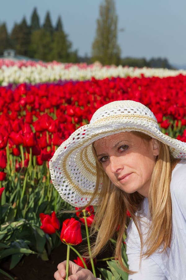 Beautiful Woman in the Tulip Field Stock Photo - Image of grow ...