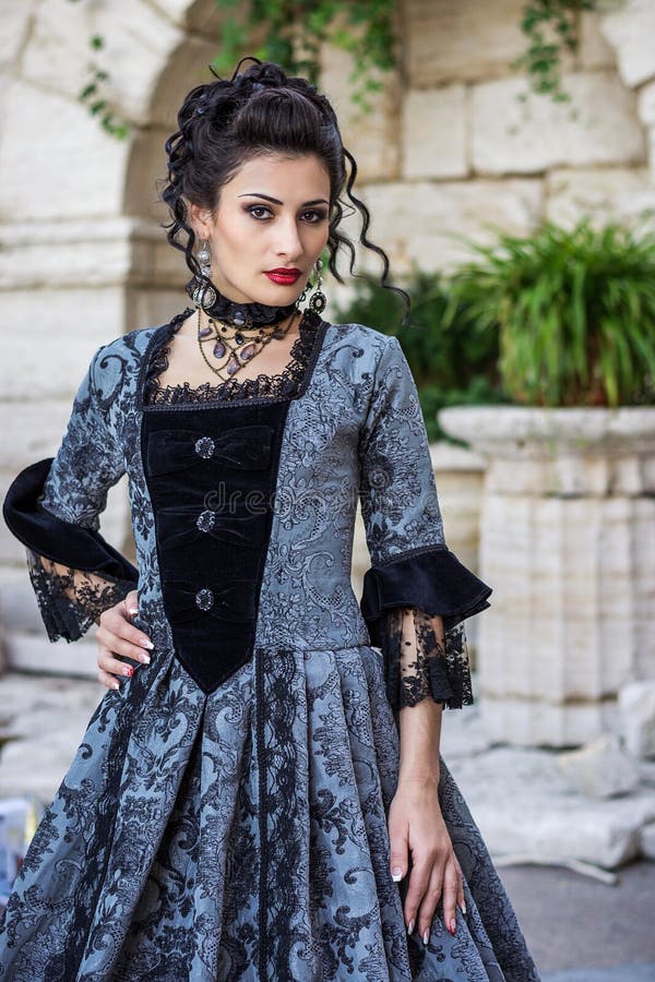 Beautiful woman in vintage dress royalty free stock images Beautiful woman in vintage dress royalty free stock images
