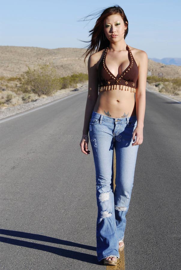 Beautiful woman walking stock image