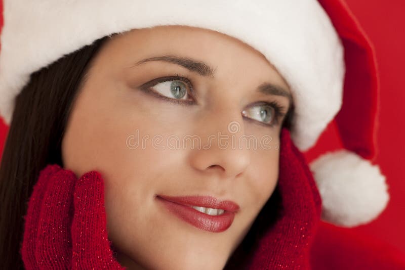 Beautiful woman wearing santa s hat