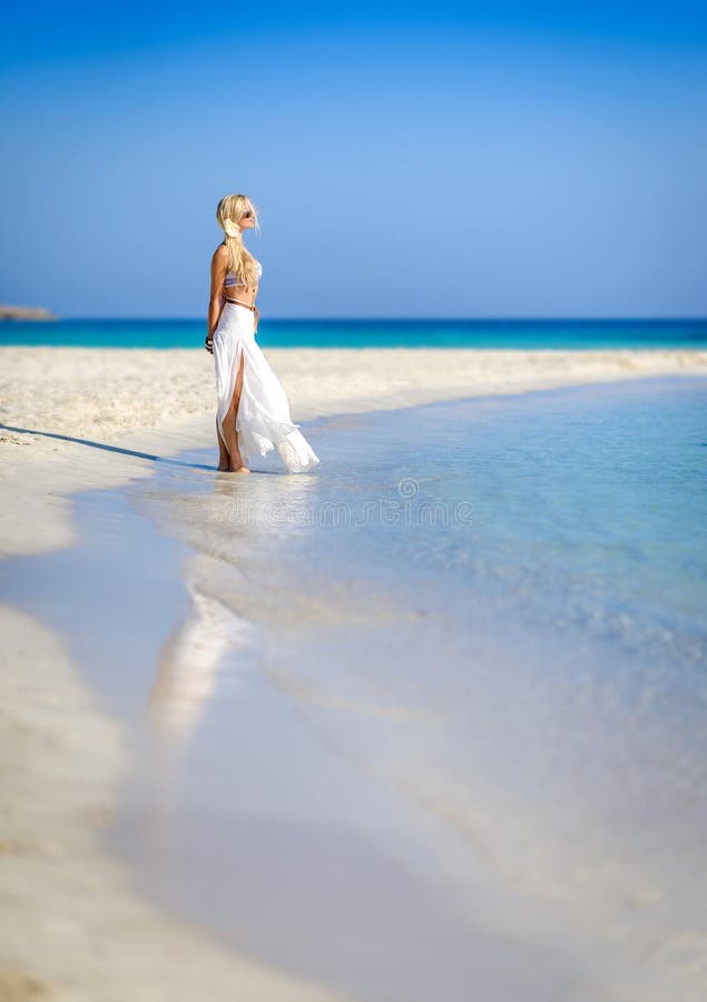 Beautiful woman in white,Nissi beach,ayia napa cyprus 2
