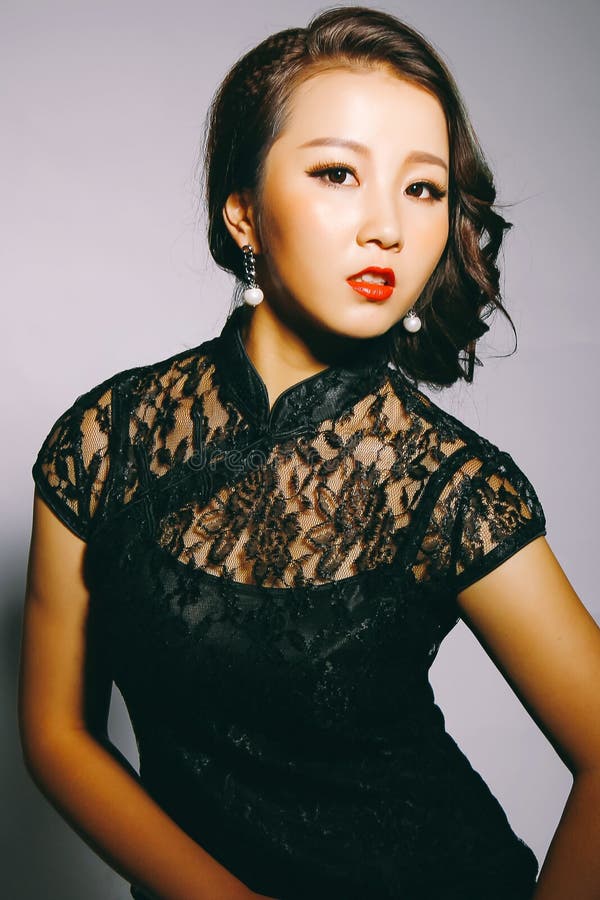 Beautiful women in Asia wear cheongsam stock images Beautiful women in Asia wear cheongsam stock images