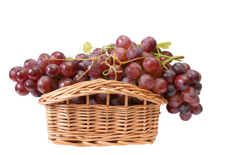 Beautiful wooden basket and ripe grapes.