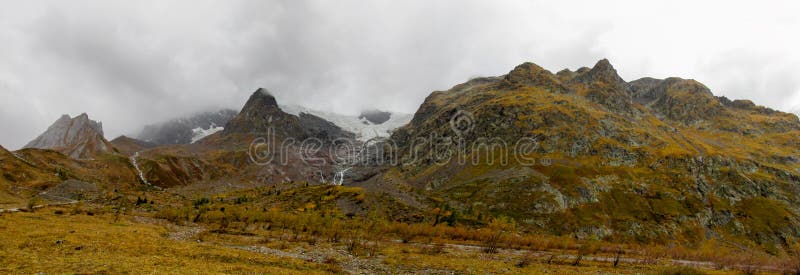 Beautiful yellow colors of autumn in the mountain valley long panorama royalty free stock photos Beautiful yellow colors of autumn in the mountain valley long panorama royalty free stock photos