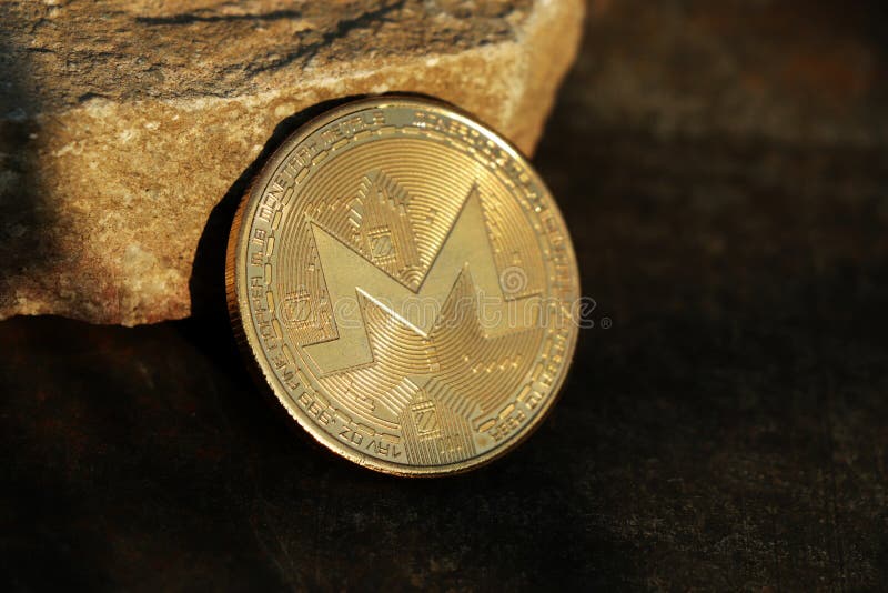 A Golden Coin Of Monero Cryptocurrency. Monero Using On Stock Market