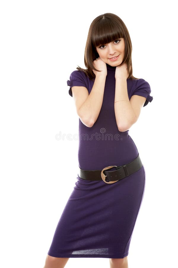 Beautiful young adult girl posing in a studio